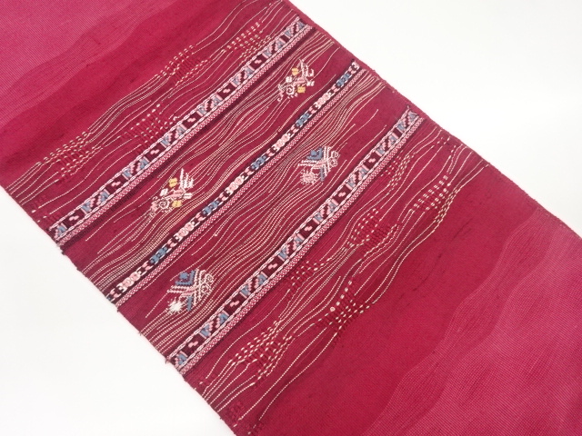 手織り紬すくい織銀糸横段に曲線・抽象模様織出し名古屋帯